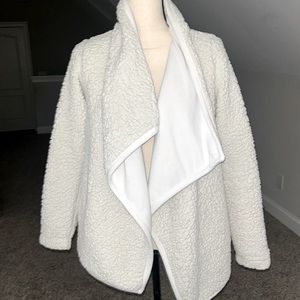 White sherpa jacket.
